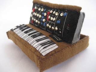 Illustration for article titled Miniature Synthesizer Replicas Cast in Felt Will Rock Your Tiny Mind